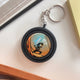 Rotating Keychain Charm: John Own, "Be Killing Sin"