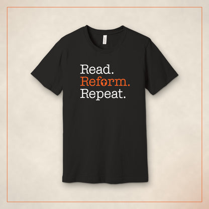 Read. Reform. Repeat. t-shirt in black on a warm parchment background